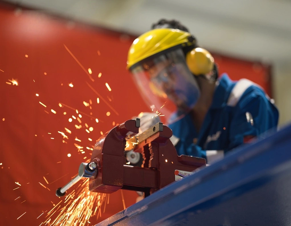 An Iraqi Basra Technical Training Centre student demonstrating welding